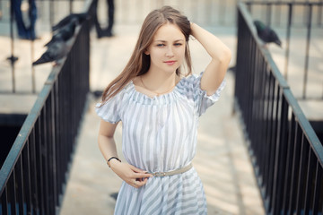 Fototapeta premium Young girl on a walk in the autumn 