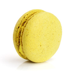yellow macaroon isolated on white background closeup
