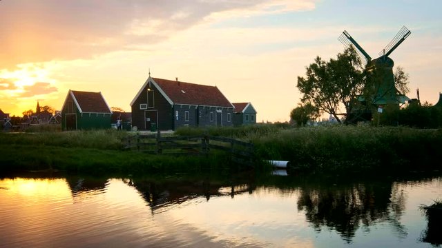 Windmills at Zaanse Schans in Holland on sunset. Zaandam, Nether
