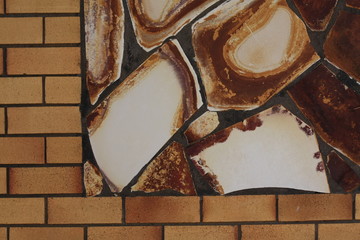 textured retro stones set into a brick wall in an old 70's design house in rural Australia