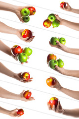 Apple. Male hand holding red apple, bunch of red and green apples, two green apples. Isolated on white background. Collage of set photos.