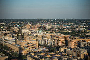 Aerial view (above) of Downtown Washington, DC from National Monument.  Sunset evening time.