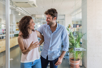 Cheerful coworkers posing in office