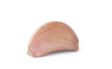 Fresh unpeeled garlic clove on white background