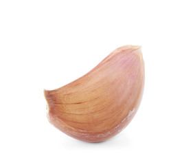Fresh unpeeled garlic clove on white background