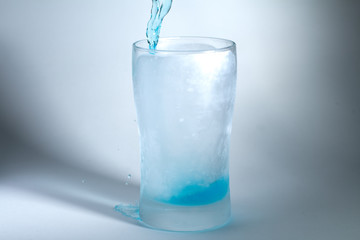 Glass of blue liquid