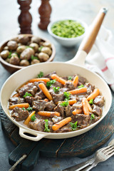 Beef stew with carrots and parsley