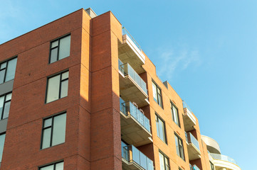 Modern condo buildings with huge windows and balconies in Montreal, Canada. 