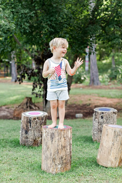 Child holding American flag