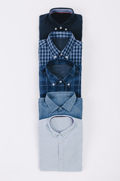 Blue shirts on white.