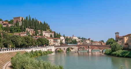 Obraz premium Ponte Pietra and Adige river in Verona town, Italy.