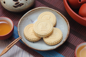 Obraz na płótnie Canvas Almond cookies isolated on white background, Chinese words on the almond cookie is 'almond', not a logo or trademark. 