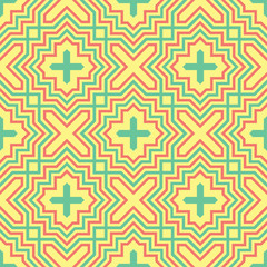 Geometric seamless pattern. Yellow background with pink and green design