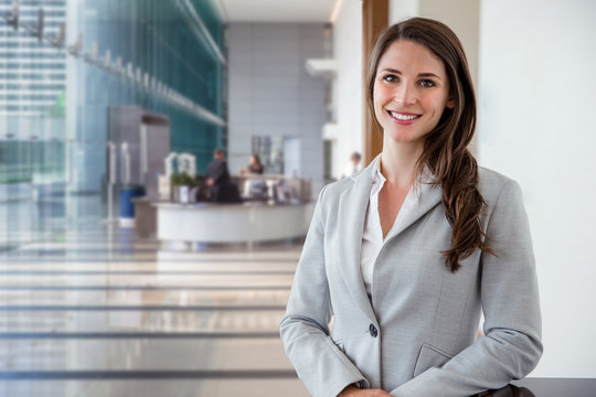 Career Motivated Successful Female Business Professional Standing Proud And Confident Inside Downtown Financial Building