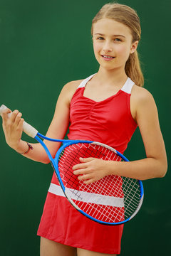 Tennis young girl player on court.