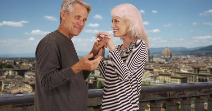 Mature couple buy a home in Florence, Cheerful male and female retire in Italy, 4k