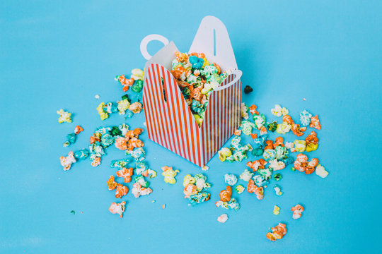 colorful candy pop corn on a blue background