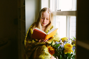 Female child reading a book