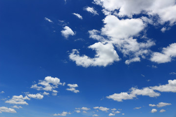Naklejka na ściany i meble A cloud that continues to the blue sky