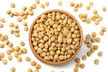 Soybeans in bowl isolated on white background. top view