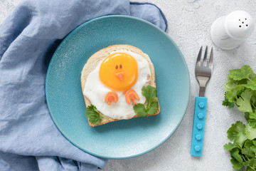 Creative food art breakfast idea for kids. Chicken shaped toast for kids