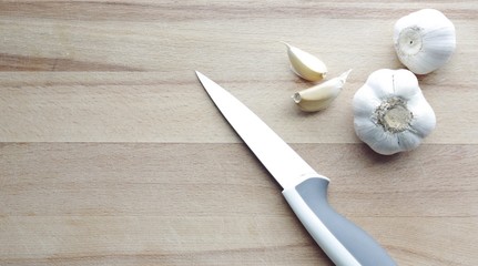 Garlic on a wooden cutting board