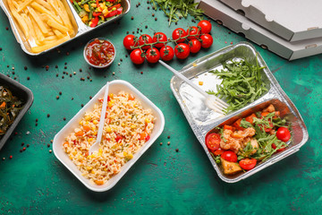 Food delivery containers on textured table