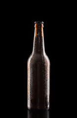 Bottle of beer on dark background