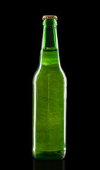 Bottle of beer on dark background