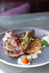 loin of calf on zucchini salad with Roquefort sauce