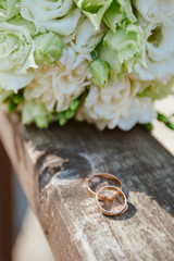 Wedding bouquet with rings on a tree