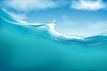 Obraz na płótnie Canvas Sea wave against the blue sky