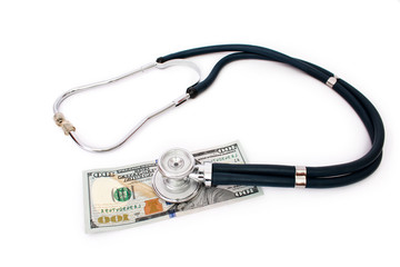 Stethoscope on money on white background - medical concept