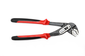 Adjustable water pump pliers tongue and groove isolated on white background. Universal wrench. Professional tool for work. Flat lay, top view