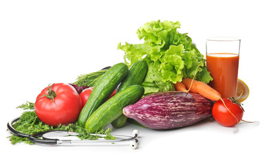 Fresh vegetables with stethoscope on white background. Healthy food concept
