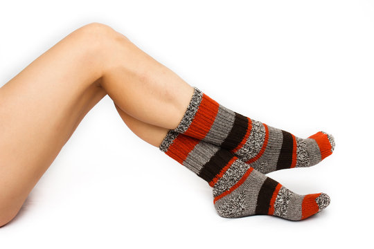 Female feet in warm socks