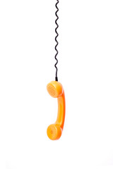 Orange retro telephone tube isolated on white background.