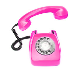 Pink retro telephone isolated on white background