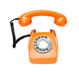 Orange retro telephone isolated on white background
