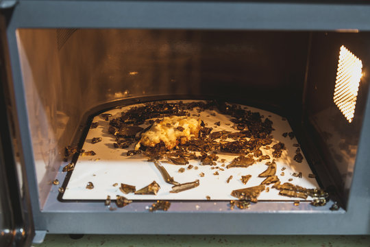 Shards of  glass plate in microwave oven