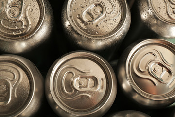 Aluminum cans of cold beer, top view
