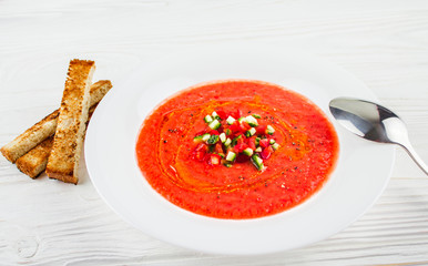 tomato soup gazpacho on a wooden background