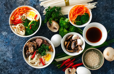 Ingredients of asian cuisine udon noodles bowl eggs vegetables s