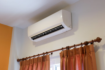 Interior Air Conditioner at a White Painted Living Room Wall