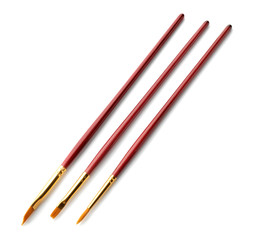 Paint brushes on white background