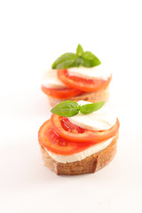 bruschetta with tomato, mozzarella and basil