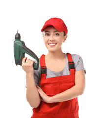 Female car mechanic with drill on white background