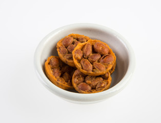 Cookies or peanut cracker on background.