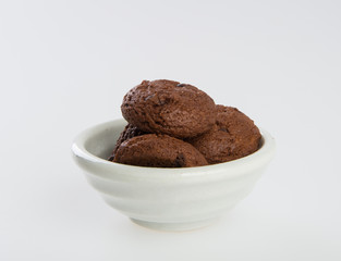 Cookies or Chocolate chips cookies on background.