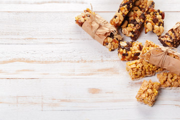 Granola bar on wooden background